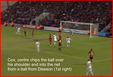 Cox, centre chips the ball over his shoulder and into the net from a ball from Dawson (1st right)