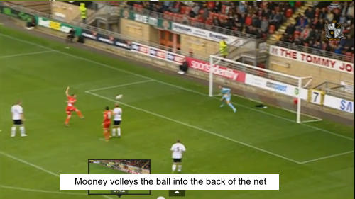 Mooney volleys the ball into the back of the net